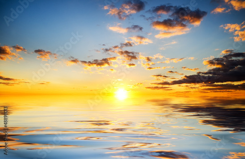 Sky background and water reflection.