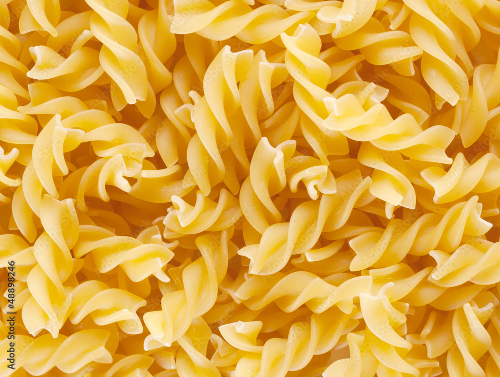 Background of twisted raw pasta Background of twisted raw pasta