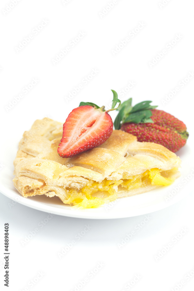 piece of apple pie and strawberry isolated on white piece of apple pie and strawberry isolated on white