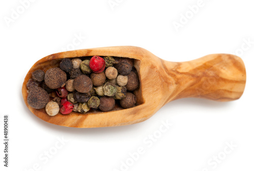 color pepper in a wooden scoop