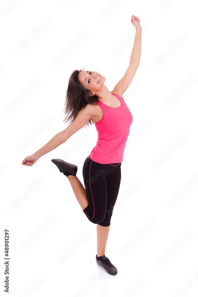 Young beautiful caucasian  fitness woman dancing