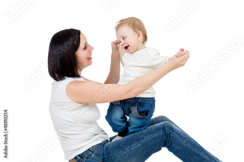 Happy mother having fun wit...