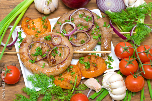 grilled sausages and vegetables - top view