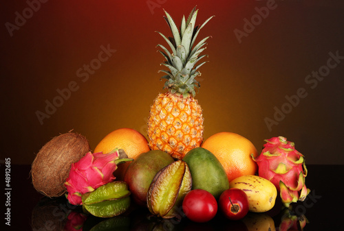 Fototapeta Naklejka Na Ścianę i Meble -  Composition of exotic fruits on colorful background