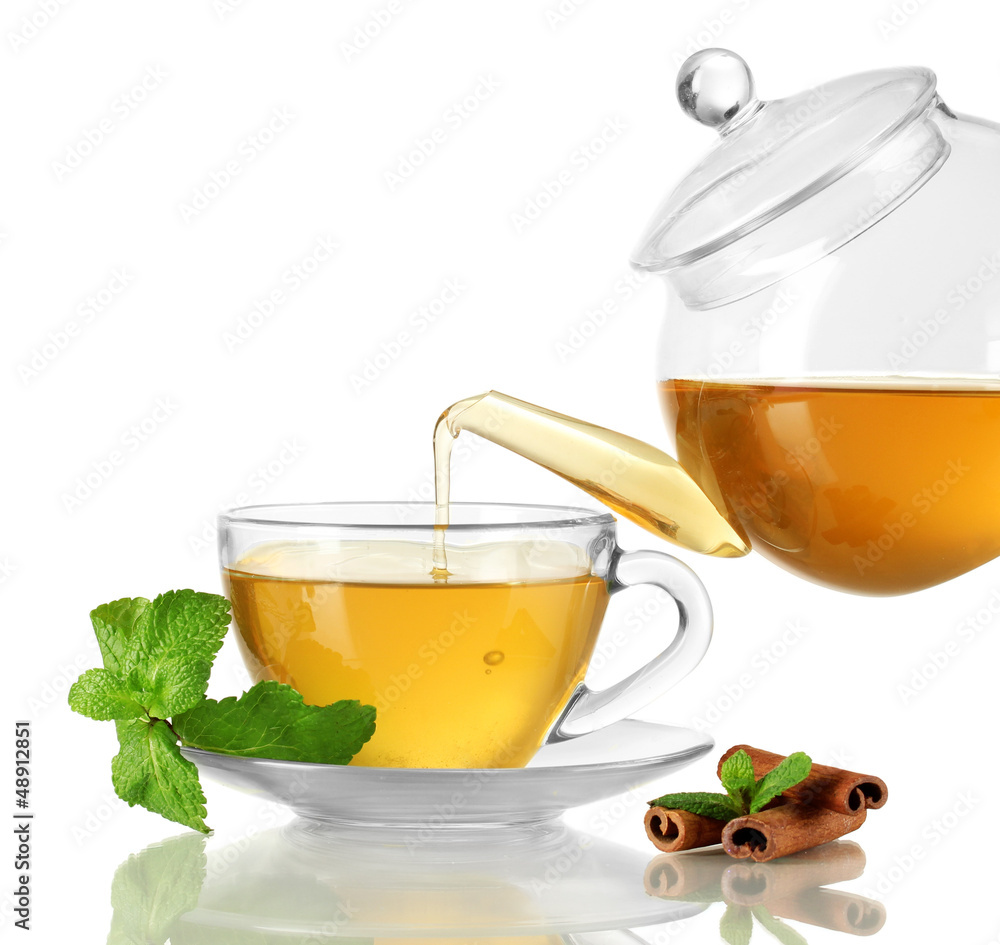 Cup of tea with mint and cinnamon isolated on white Cup of tea with mint and cinnamon isolated on white