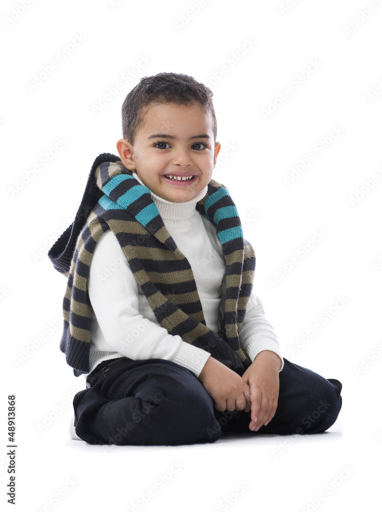 Handsome Boy Sitting with a Smile Handsome Boy Sitting with a Smile
