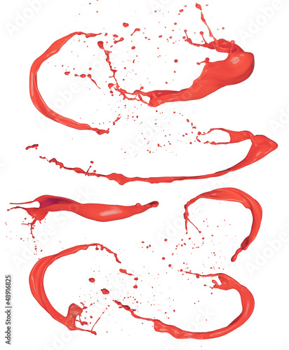 Shot of red paint splashes, isolated on white background