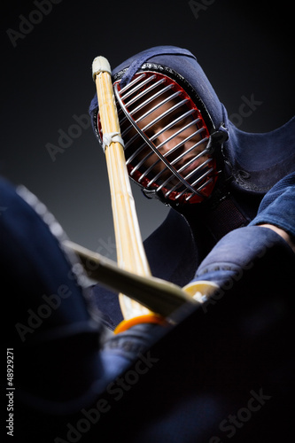 Close up shot of competition of two kendo fighters