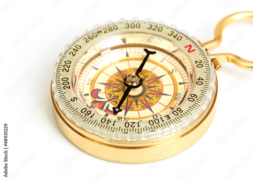 old styled, gold compass isolated on white background