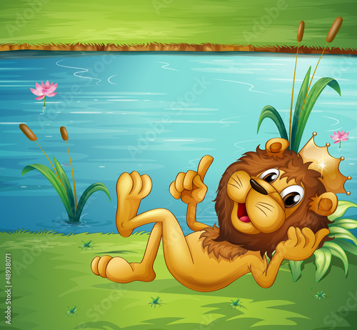 Fototapeta Naklejka Na Ścianę i Meble -  A lion with a crown