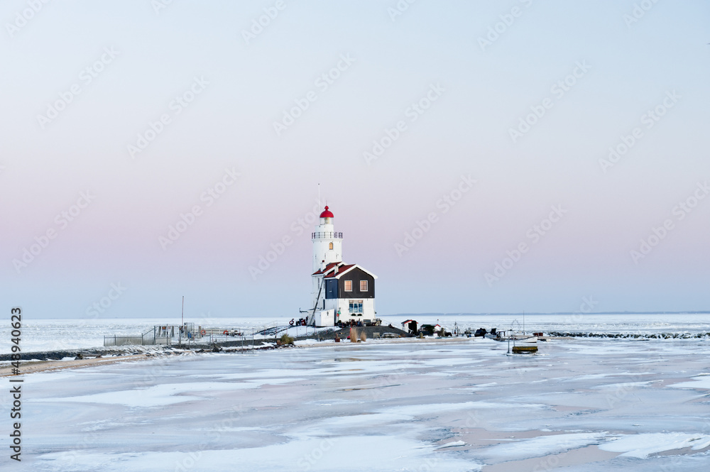 Fototapeta premium Frozen Marken Lighthouse in Winter