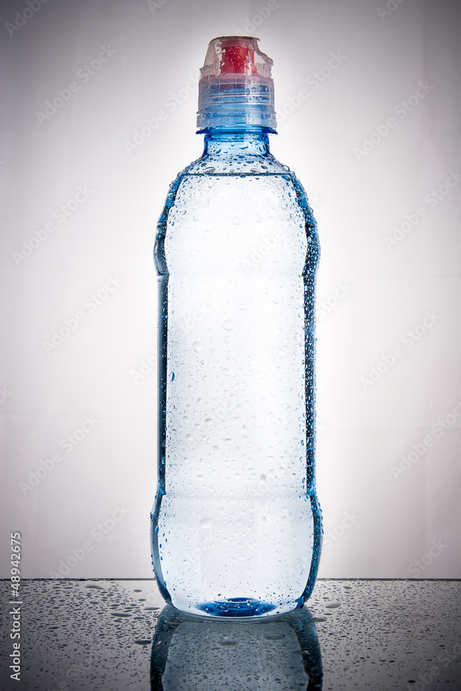 Plastic bottle of drinking water isolated on white Plastic bottle of drinking water isolated on white