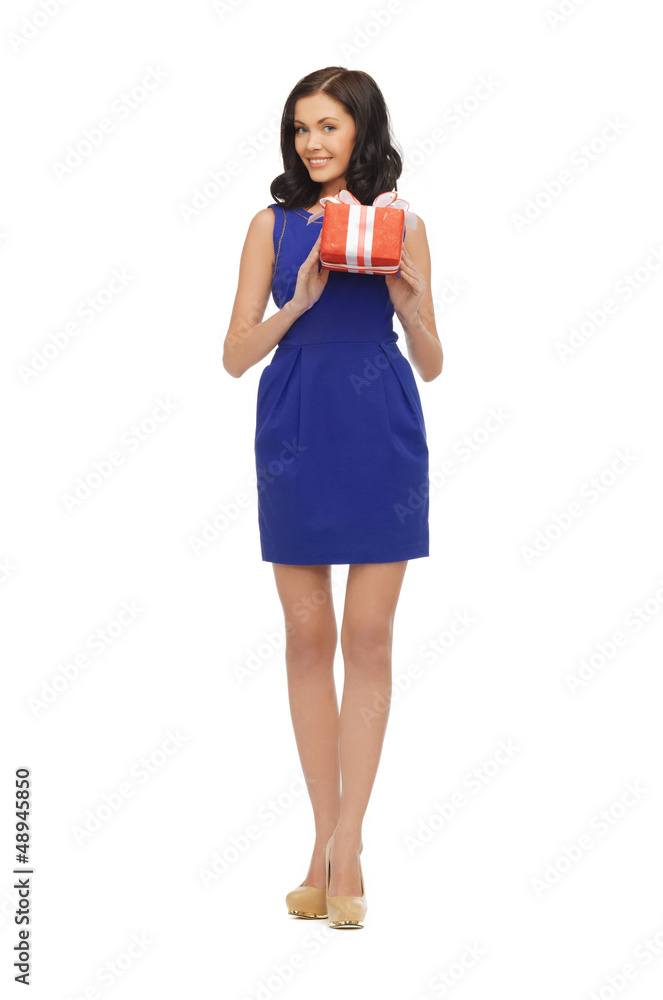 lovely woman in blue dress with present lovely woman in blue dress with present