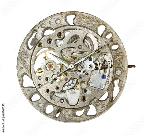 Old watch mechanism isolated on white background