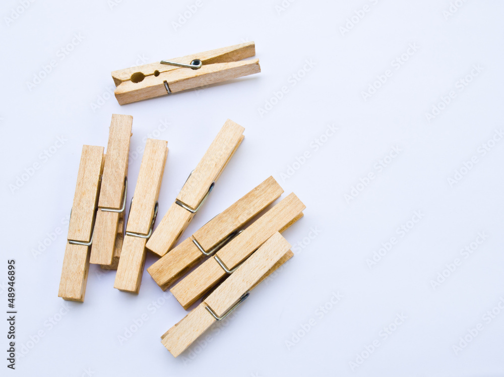 Wooden clothes clips isolated on white back ground Wooden clothes clips isolated on white back ground