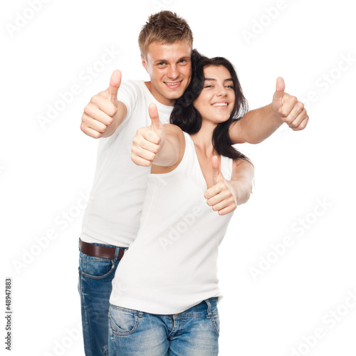 Happy young couple with his thump up. Focus On hands
