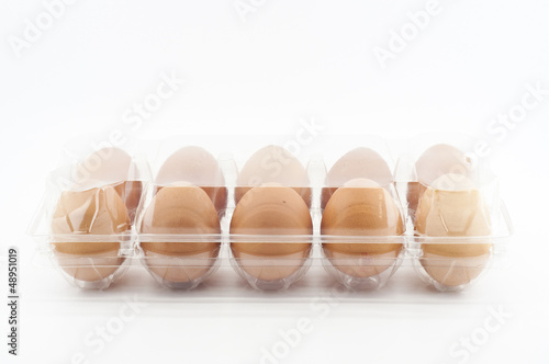 Eggs in plastic tray.