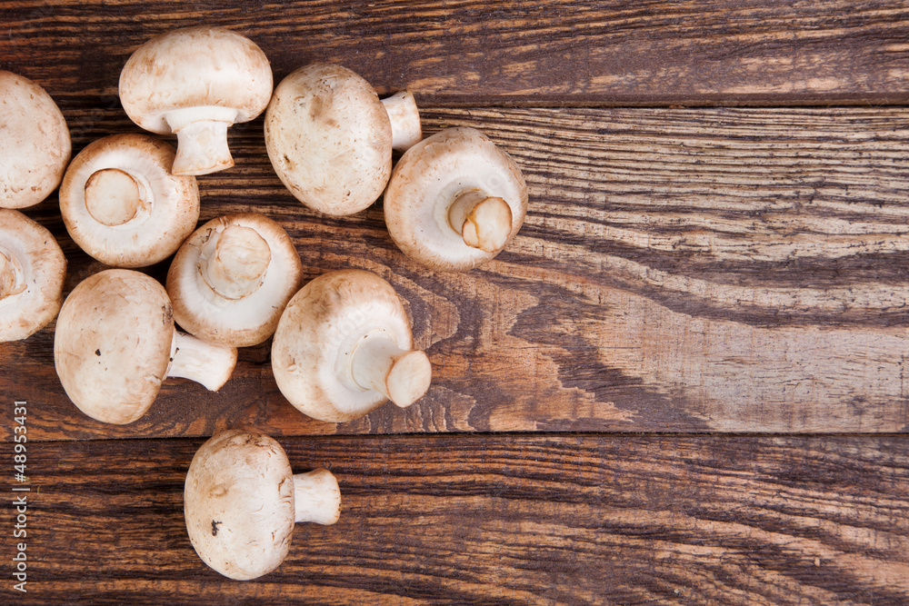 Mushrooms on a wooden table Mushrooms on a wooden table