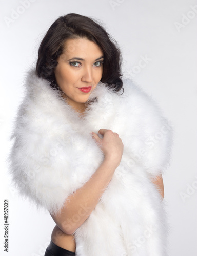 Beautiful girl in a fur shawl