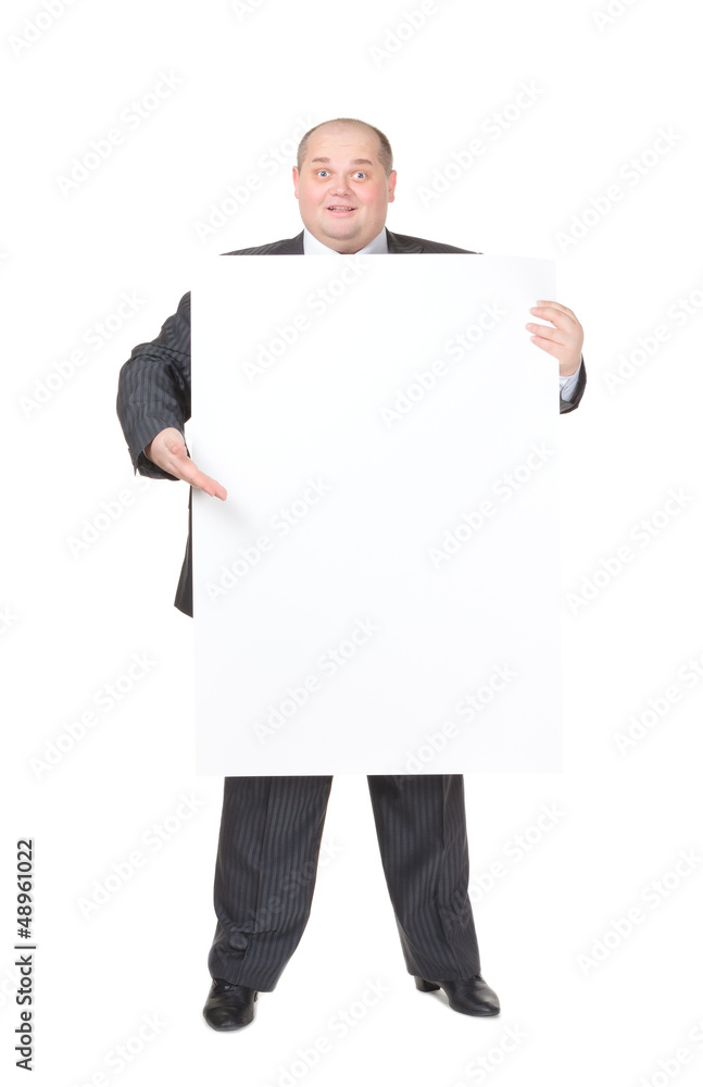 Cheerful overweight man with a blank sign Cheerful overweight man with a blank sign
