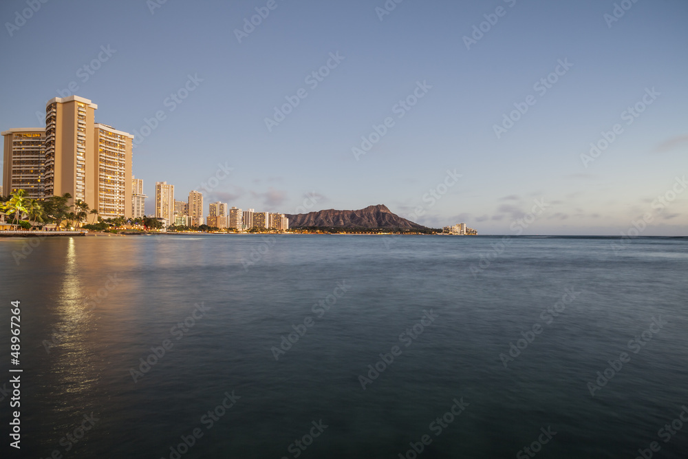 Dusk light on Waikiki Bay in Honolulu Hawaii Dusk light on Waikiki Bay in Honolulu Hawaii