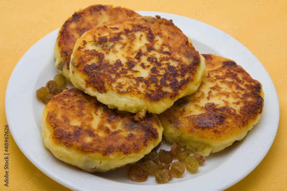 Sweet cheese pancakes on a plate