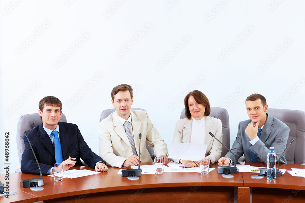 Four businesspeople at meeting Four businesspeople at meeting
