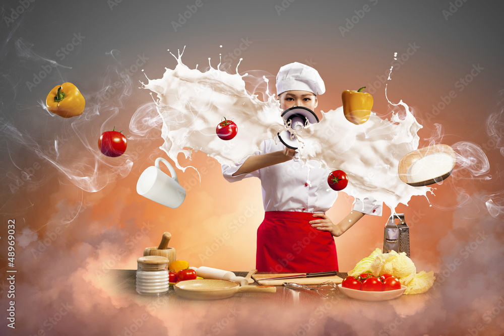 Asian female cook holding megaphone Asian female cook holding megaphone