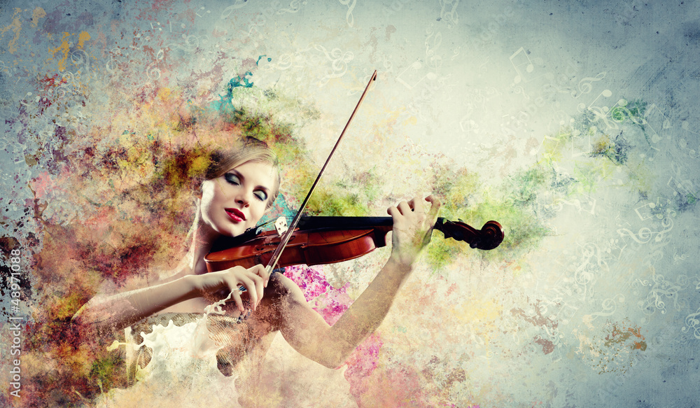 Gorgeous woman playing on violin