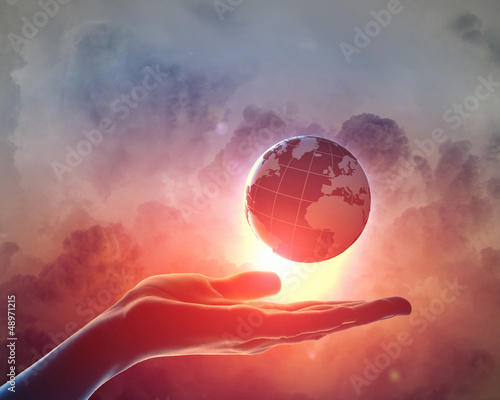 Fototapeta Naklejka Na Ścianę i Meble -  Image of earth planet on hand