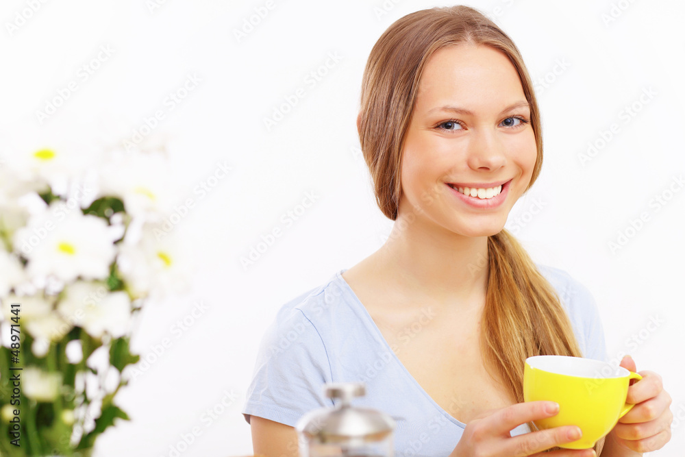 Beautiful young woman drinking tea Beautiful young woman drinking tea