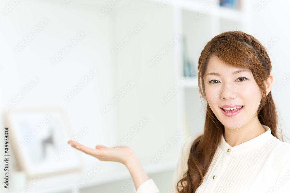 Beautiful asian woman relaxing in the room