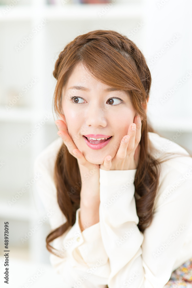 Beautiful asian woman relaxing in the room Beautiful asian woman relaxing in the room