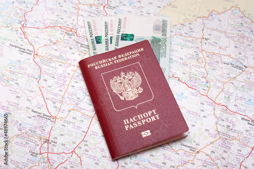 passport with money on the map of thailand