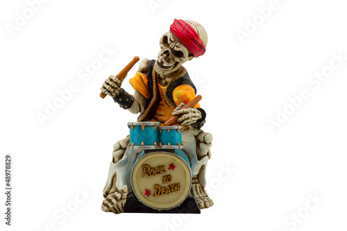 Skeleton plays the drums rock