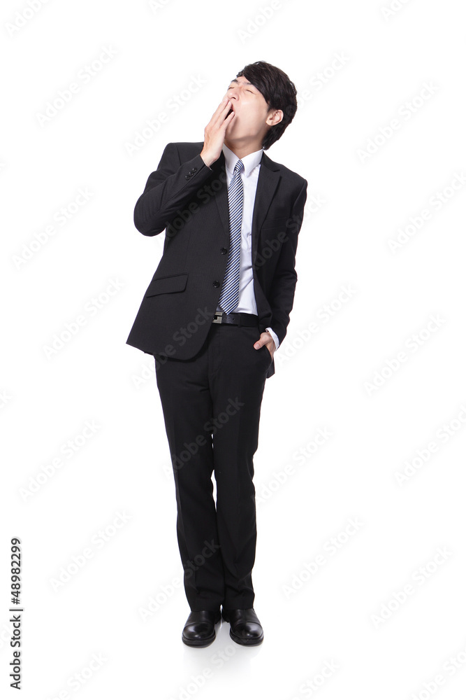overworked business man yawning overworked business man yawning