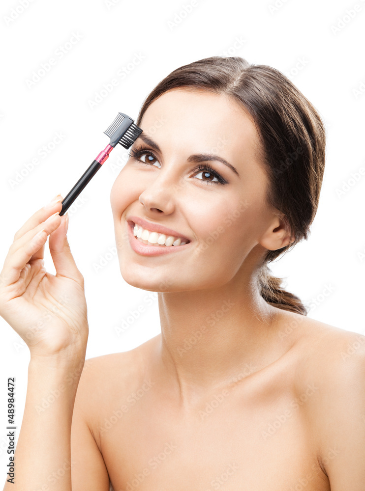Smiling woman with make up brush, isolated Smiling woman with make up brush, isolated