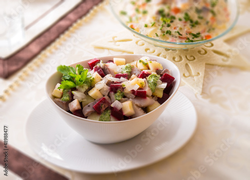 Herring salad with beetroot - selective sharpness-deep photo