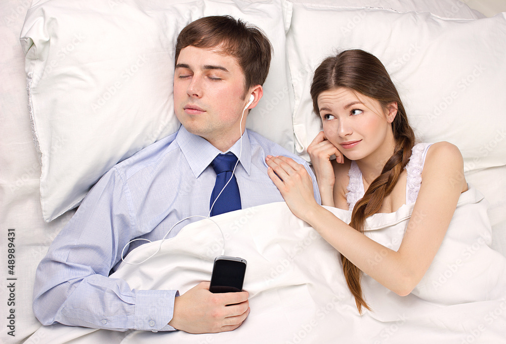 businessman and woman in bed businessman and woman in bed