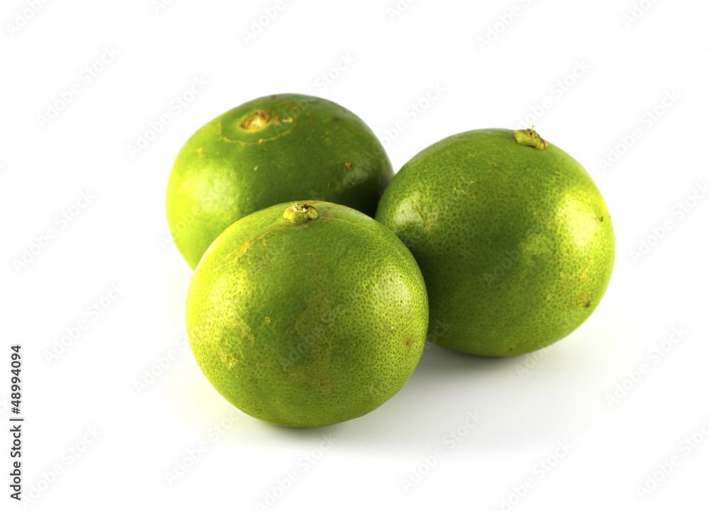 Green lemons and fresh ripe lemon isolated on white background. Green lemons and fresh ripe lemon isolated on white background.