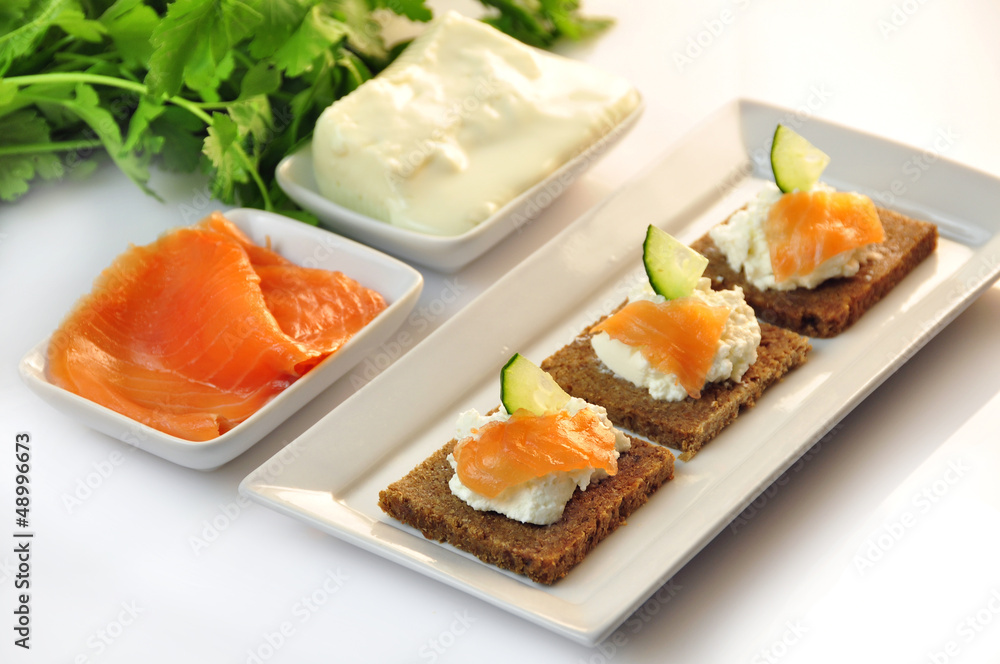 canapes rye bread with ricotta cheese and smoked salmon canapes rye bread with ricotta cheese and smoked salmon