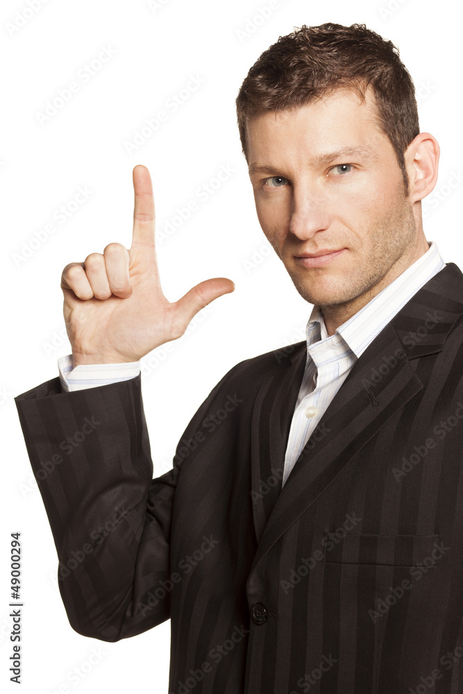 Businessman Points Up to Blank Copy Space on white background Businessman Points Up to Blank Copy Space on white background