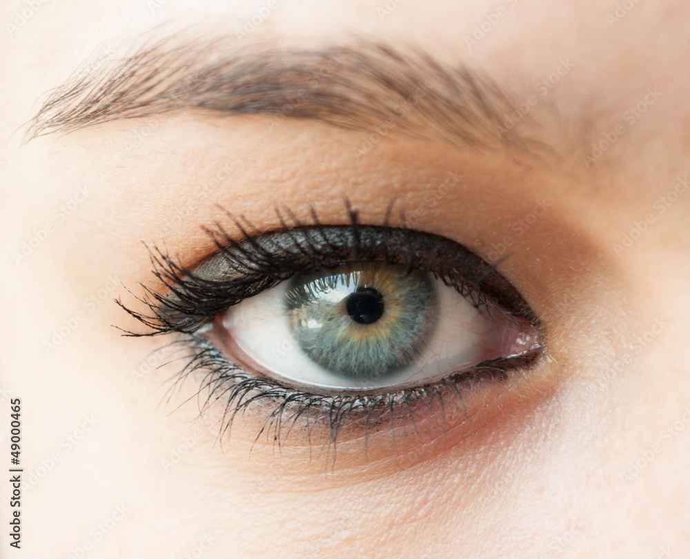 Beautiful blue woman eye close up Beautiful blue woman eye close up
