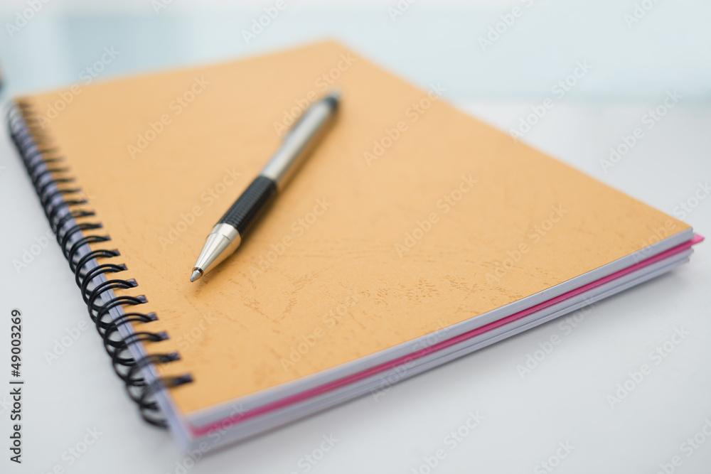 Notebook and pen Notebook and pen