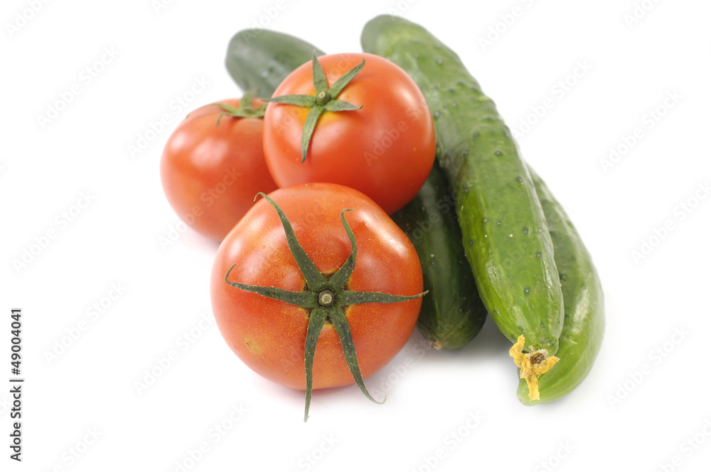 Close up three tomatoes and three cucumbers Close up three tomatoes and three cucumbers