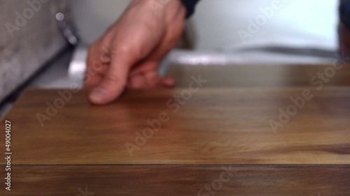 man works. installs laminate