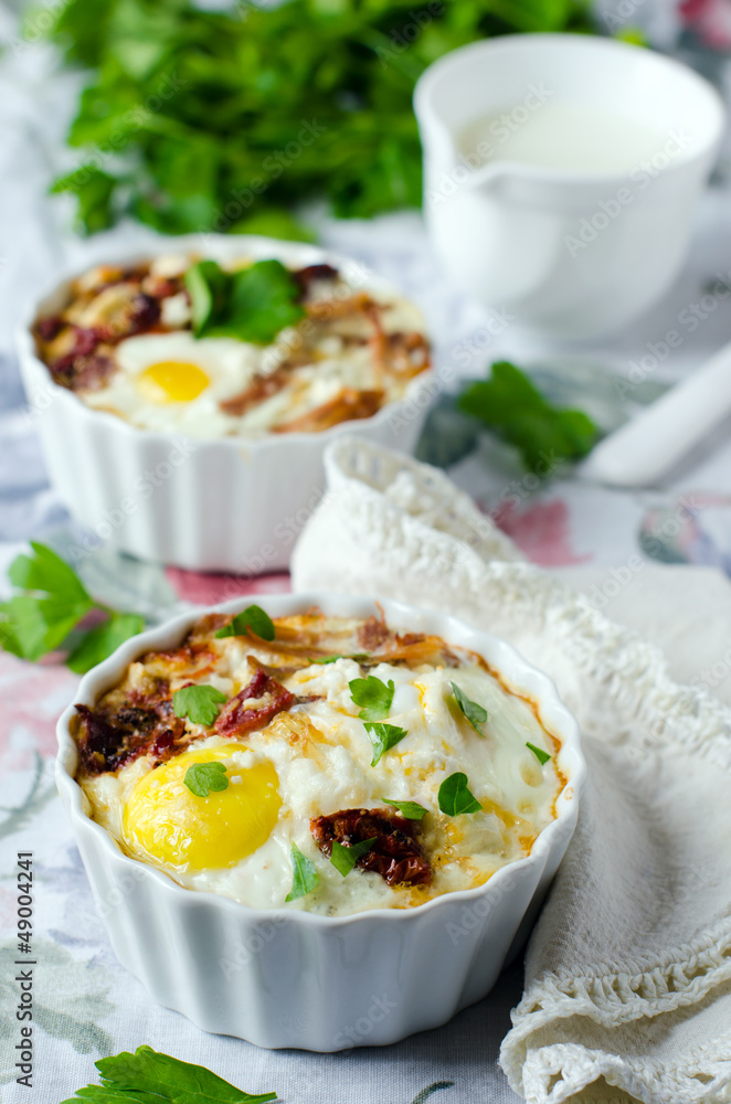 Eggs baked with tomatoes and meat