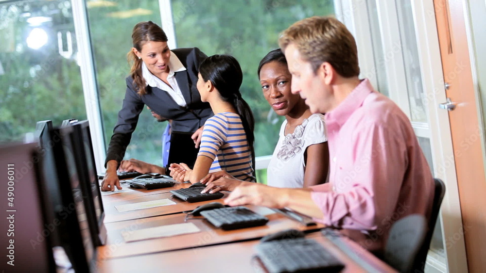 IT College Students Working with Tutor IT College Students Working with Tutor