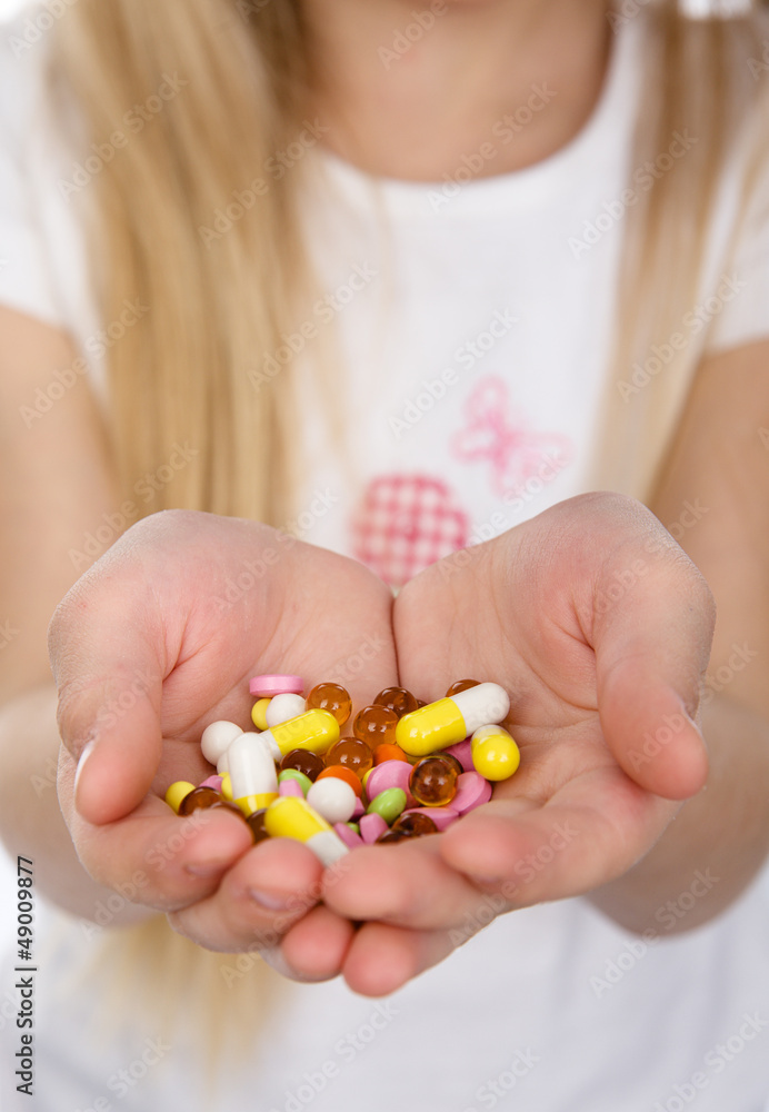 pills in kid hands pills in kid hands
