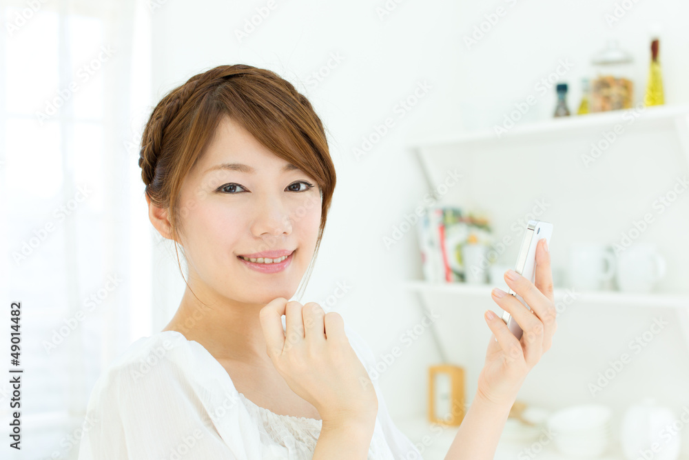 Beautiful young woman using a cellular Beautiful young woman using a cellular
